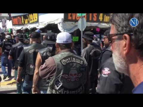 Police keep an eye on members of the Outlaw Motorcycle Club on Main Street