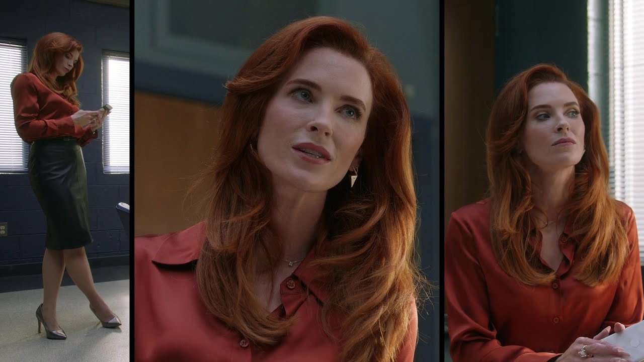 Bridget Regan in red satin blouse and black leather skirt - The rookie - S05E20
