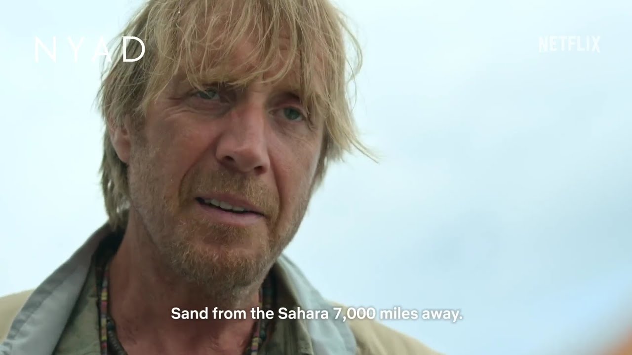 Diana (Annette Bening) meets her no-nonsense navigator John Bartlett (Rhys Ifans) in NYAD. (Scene)